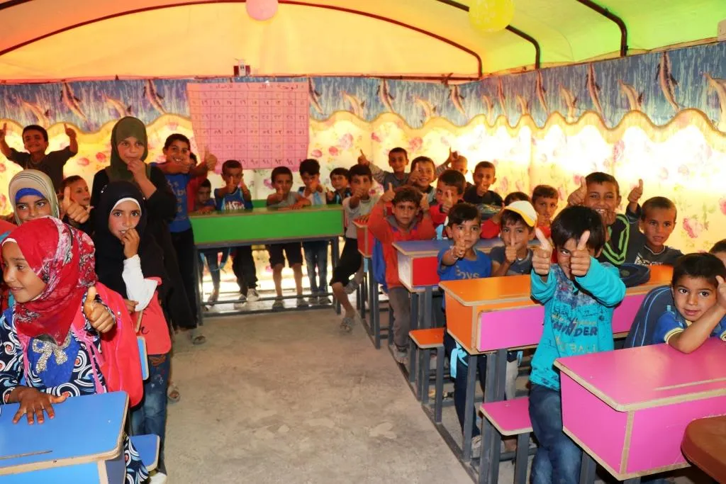 Navenda Elwan zarokên Ebû Xeşeb himbêz dike