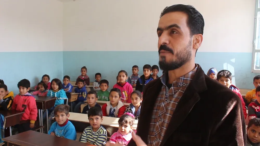 Piştî 7 salan cara yekem pirtûkên dibistanan li şagirtên Tebqayê belav kirin