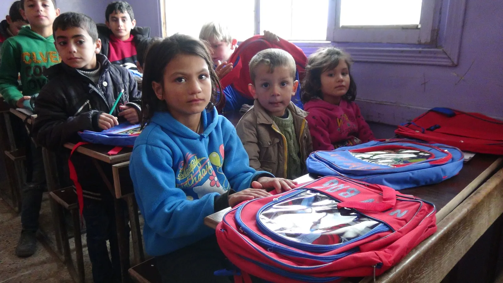 12 hezar çente li xwendekarên Efrînê hatin belavkirin