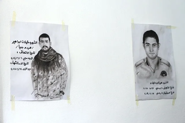 Şêniyên Tirbespiyê li goristana şehîdan dar û kulîlk çandin