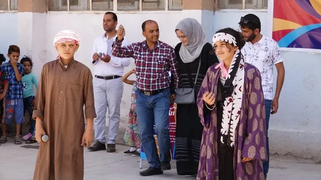 Li Reqayê "Ahenga Rengan" a zarokan