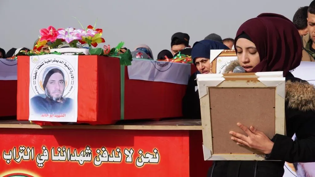 Şêniyên Tebqayê şehîdên êrişa li dijî Avahiya Gerînandeya Bazirganiyê oxir kirin