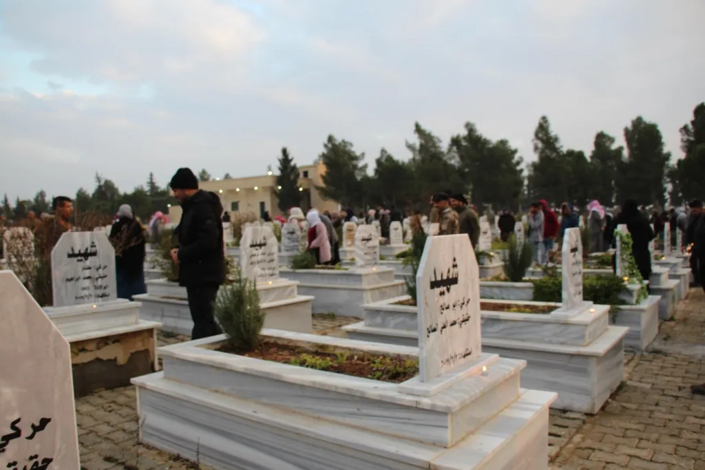 Şehîdên meha Kanûnê li Minbicê hatin bibîranîn