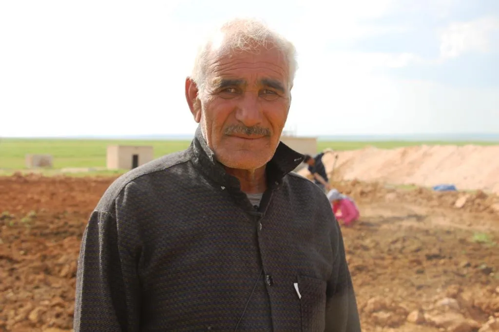 Şêniyên gundên Eyn Îsayê di bin topbaranê de çandiniyê dikin