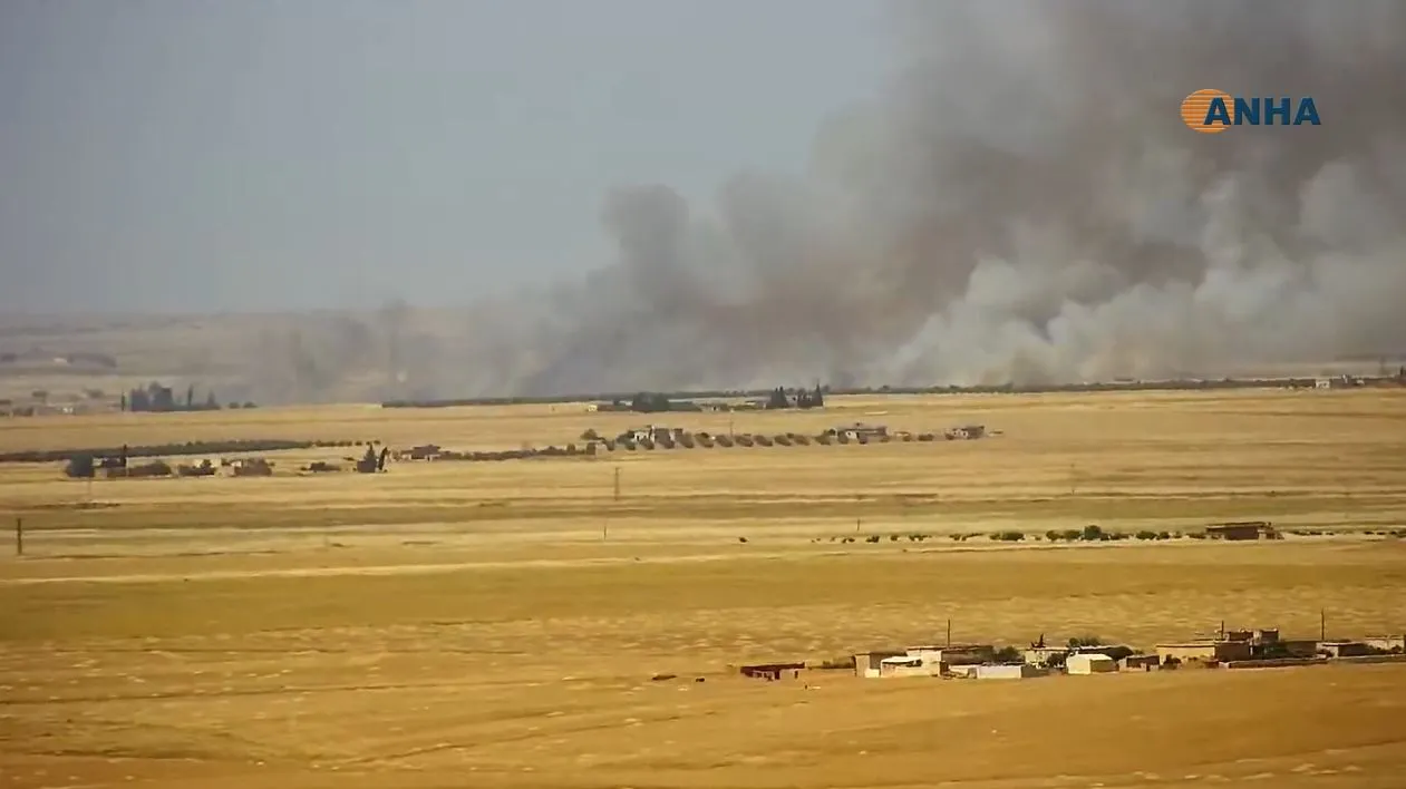 Topbarana dewleta Tirk li rojavayê Girê Spî didome, agir bi zeviyan ket
