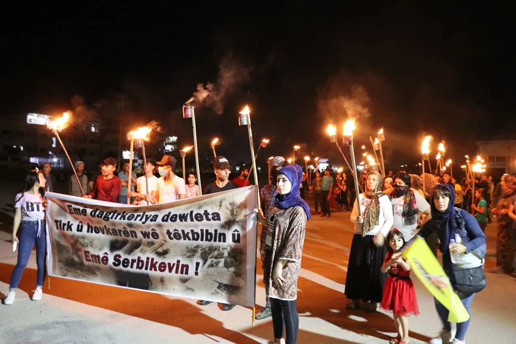 ​​​​​​​Li gelek navendan tecrîd, êrişên li ser gorên şehîdan û Zînî Wertê hatin şermezarkirin