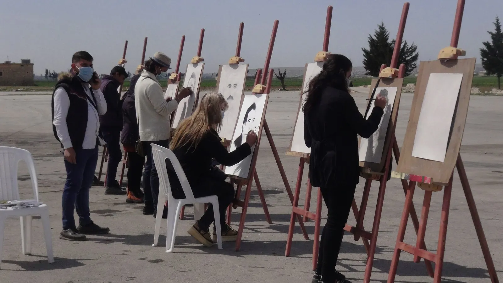 ​​​​​​​Di çalakiya konê xwepêşandanê de wêneyên rêber Ocalan hatin xêzkirin