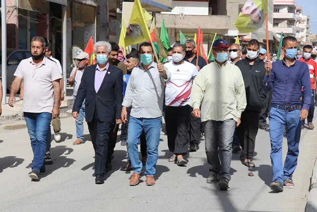 ​​​​​​​Şêniyên Qamişloyê li dijî êrişên li ser Herêmên Parastinê yên Medyayê meşiyan