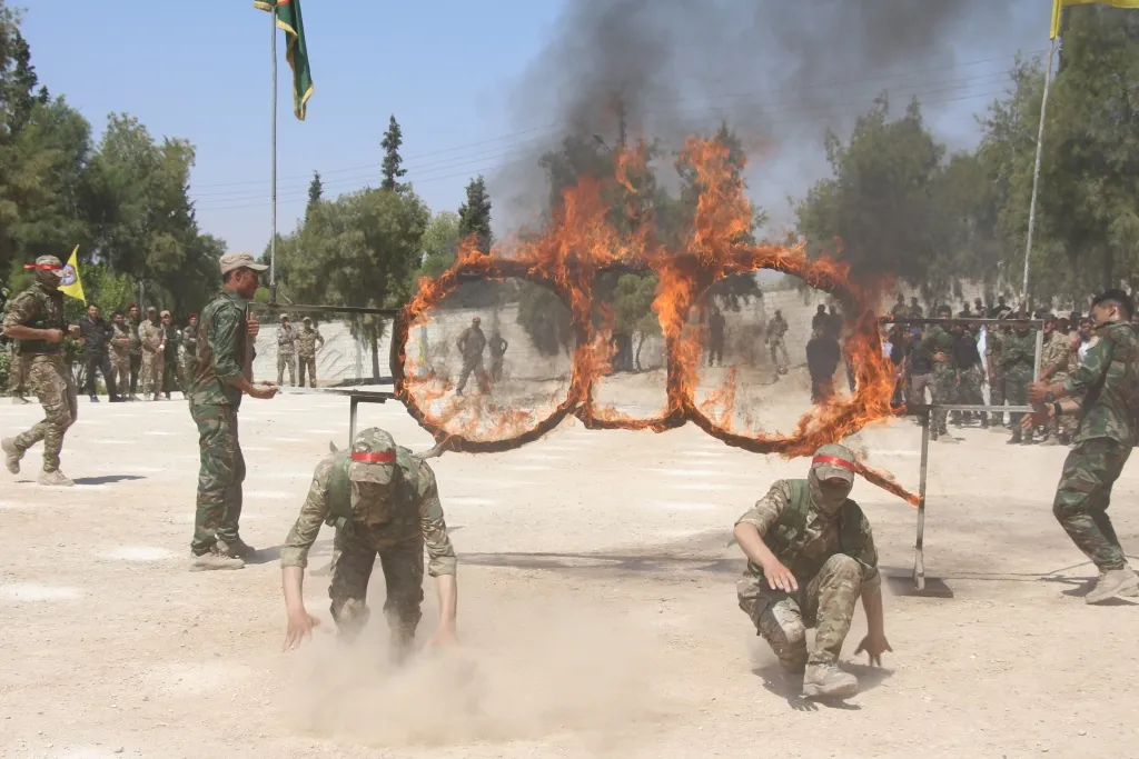Li Minbicê dewreyek nû ya hêzên Erkaxweparastinê bi dawî bû
