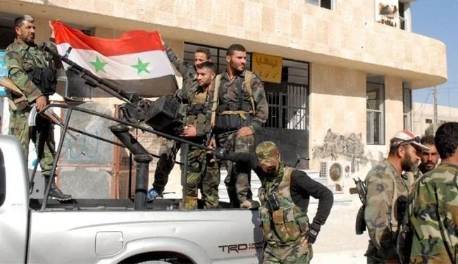 Hêzên hikumeta Şamê êrişên li dijî Dera El-Beled zêde kir