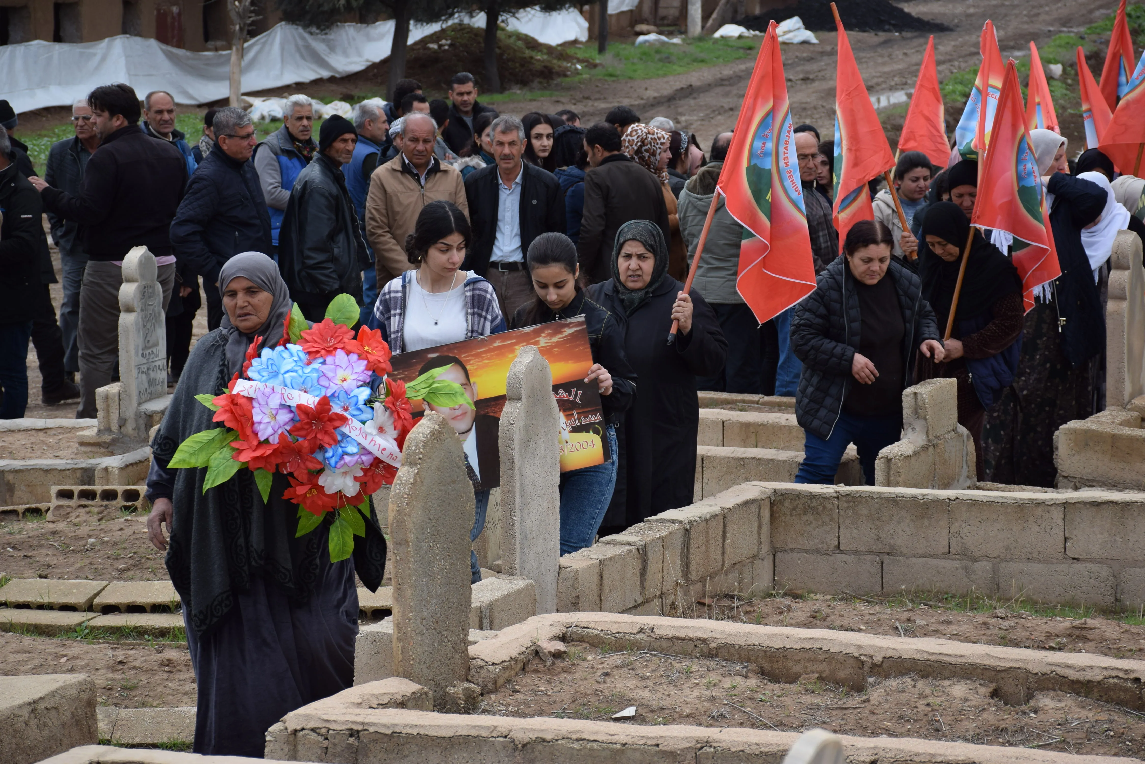 ​​​​​​​Şêniyên Qamişloyê serdana goristana şehîdên 12'ê Adarê kir