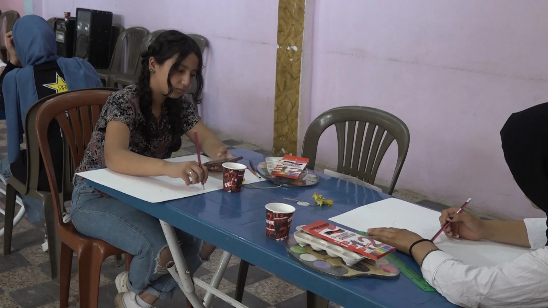 Jinên ciwan li Tebqayê pêşangeheke wêneyan vekir