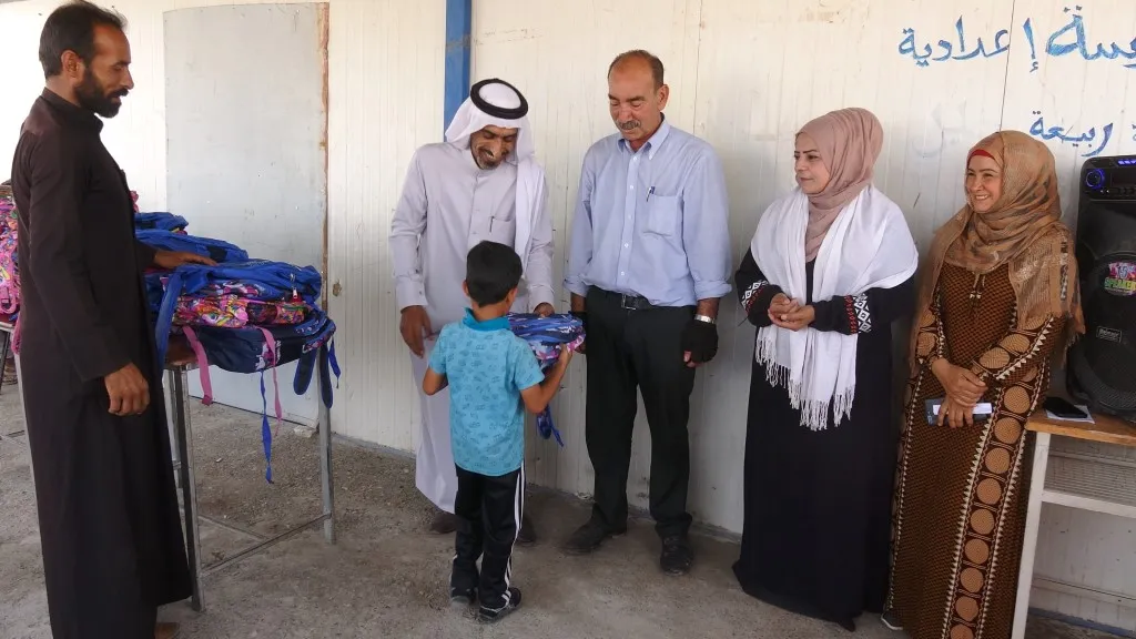 Rêveberiya Kampa Girê Spî zarokên sêwî xelat kirin