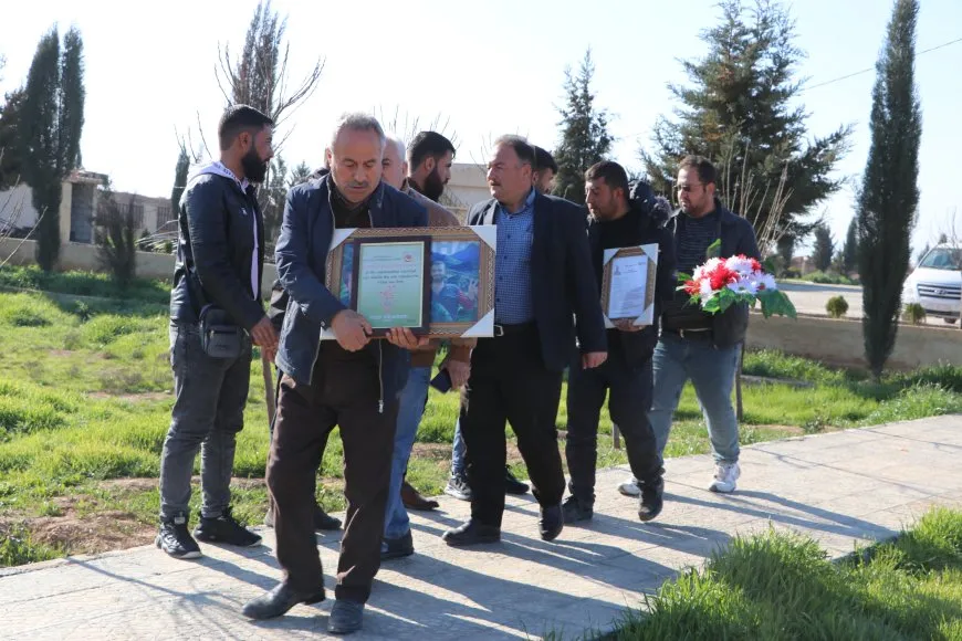 Di salvegera 11`an a ANHA`yê de serdana gorên şehîdan hate kirin