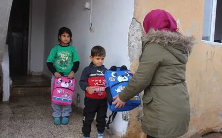 Alîkarî li zarokên koçber ên ji Efrîn-Şehbayê hatin belavkirin