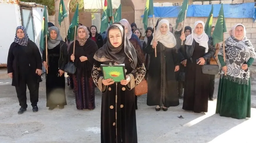 Jinên ji Eyn Îsayê beşdarbûna kujerên jinan di desthilata Şamê de şermezar kir