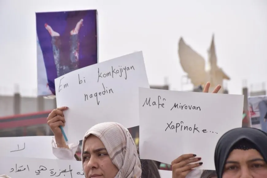 Bi sedan şêniyên kantona Firatê li dijî komkujiyan meşiyan