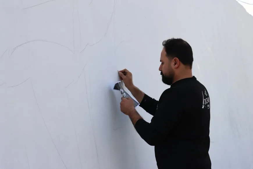 Gurûpa Orkêd wêneyê şehîdên Şêx Meqsûd xêz kirin