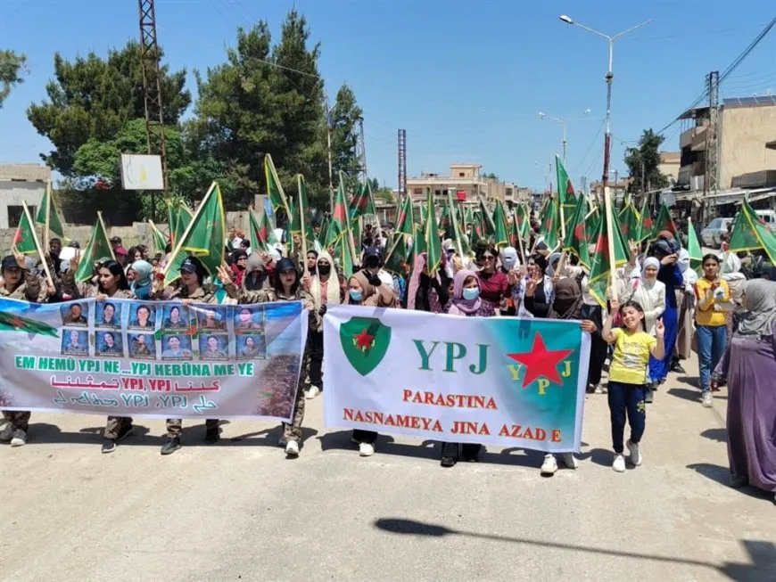 Bi sedan jin ji bo piştgiriya YPJ`ê meşiyan