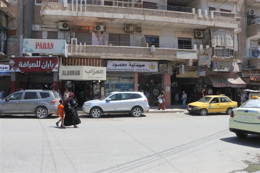 Nivîsên Kurdî li ser tabeleyên dikanan