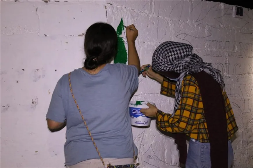 Li ser dîwarên Til Temirê wêne û nivîsên ji bo piştgiriya zimanê Kurdî