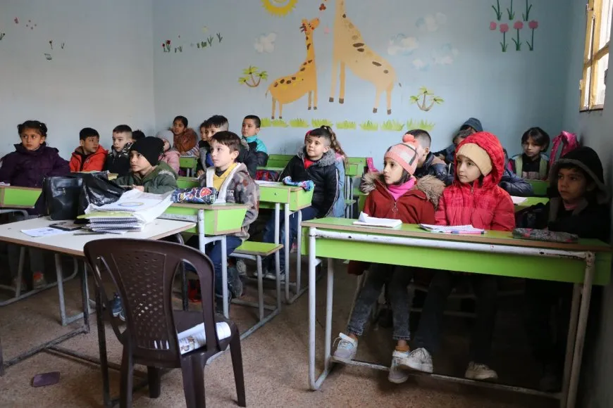   Учащиеся измучены холодом в школах Шех Максуда в результате осады